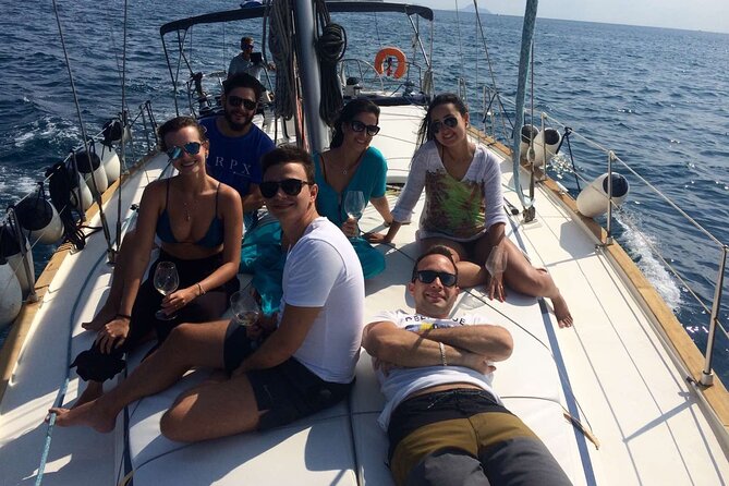 Santorini Private Daytime Sailing Cruise with Meal, Drinks &Transfer included - Captain George and the On-Board Narration Style