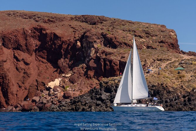 Santorini Private Sunset Sailing Tour with Dinner, Drinks &Transfer included - Between the Volcanoes: Warm Water and a More Intimate Caldera View