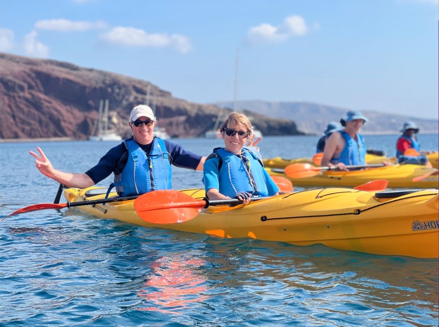 Santorini: Sea Caves Kayak Trip with Snorkeling and Picnic - White Beach Cliff Jump Moment: Adrenaline With a Safety Frame