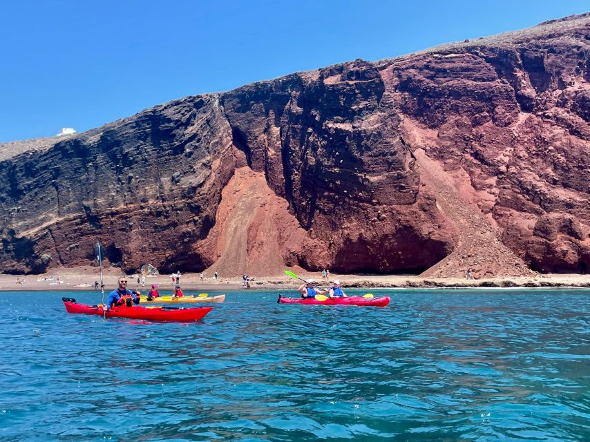 Santorini: South Sea Kayaking Tour with Sea Caves and Picnic - Guide style: why humor and safety belong together