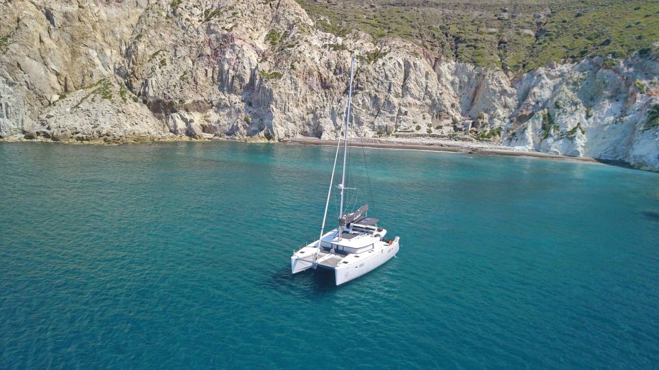 Santorini: Southern Island Luxury Catamaran Cruise with Meal - Entering Santorini’s volcano coast from the water