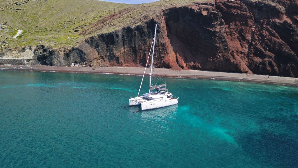 Santorini: Southern Island Luxury Catamaran Cruise with Meal - Mésa Pigádia: a second swim window with more water time