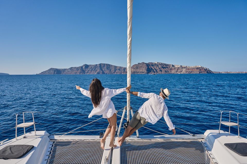 Santorini: Southern Island Luxury Catamaran Cruise with Meal - Nea Kameni volcano: hot springs island and the main swim-and-snorkel highlight