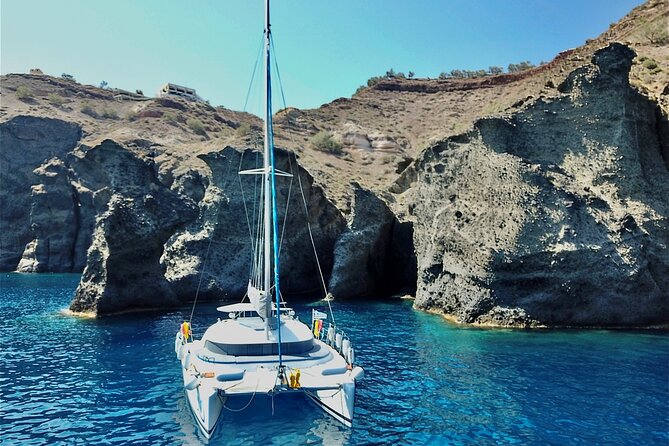 Santorini: Standard Small-Group Catamaran Cruise with Food/Drinks - Mesa Pigadia Beach: the swim-and-snorkel stop plus the BBQ buffet