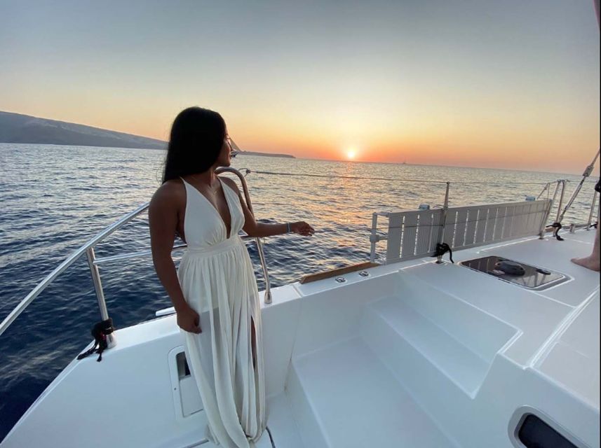 Santorini: Sunset Cruise with Greek Dinner and Transfer - Cruising the Caldera: The Views Are the Real Entertainment