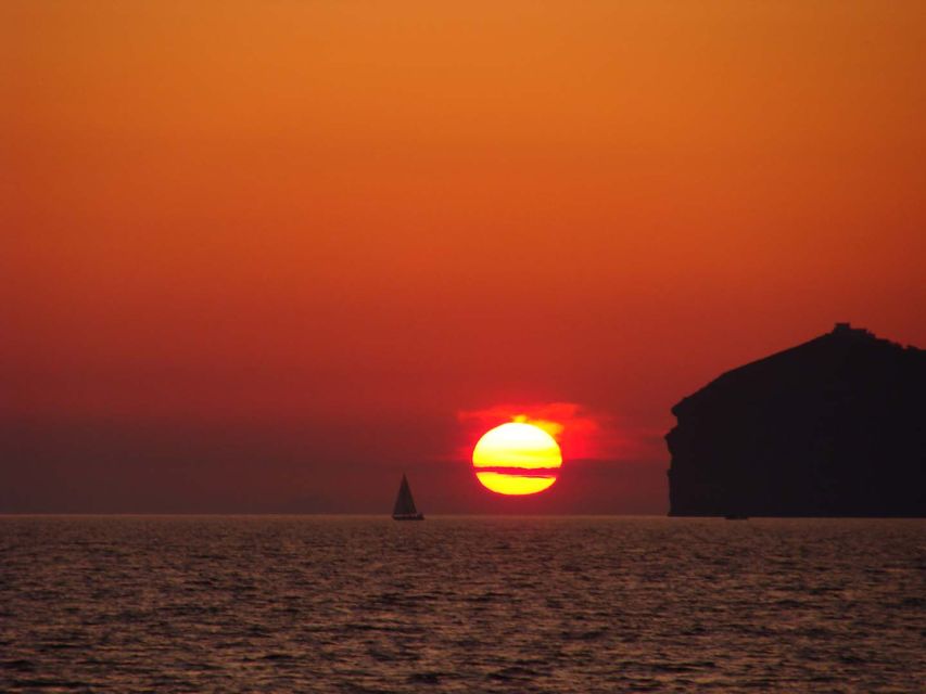 Santorini: Sunset Cruise with Greek Dinner and Transfer - The Greek Dinner on Board: BBQ, Fish, Shrimp, and a Real Meal