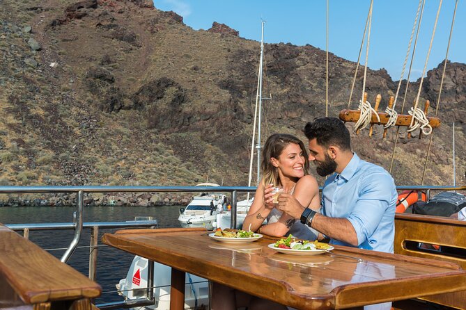 Santorini Sunset Dinner Cruise Including Nea Kameni Visit - Stop 2: hot springs swim time around Palea Kameni