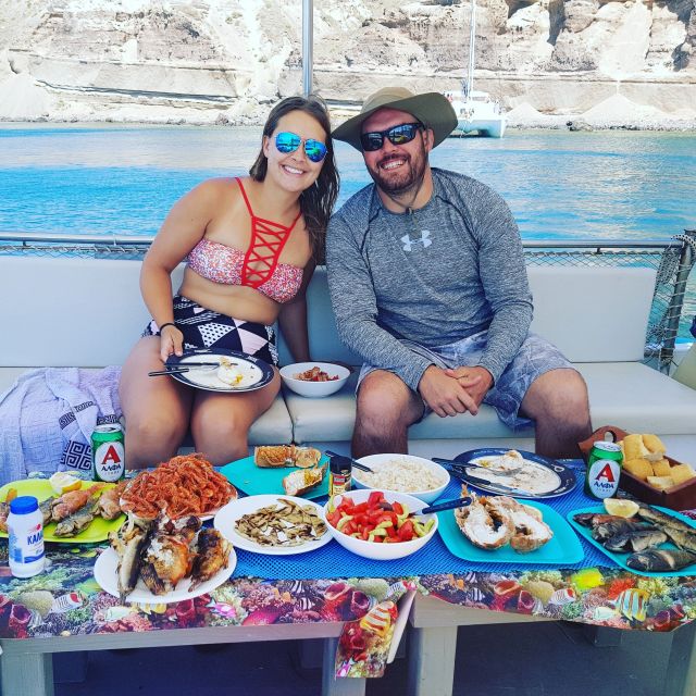 Santorini Sunset Fishing Trip with Dinner and Drinks - The anchor stop: swim, snorkel, and watch marine life up close