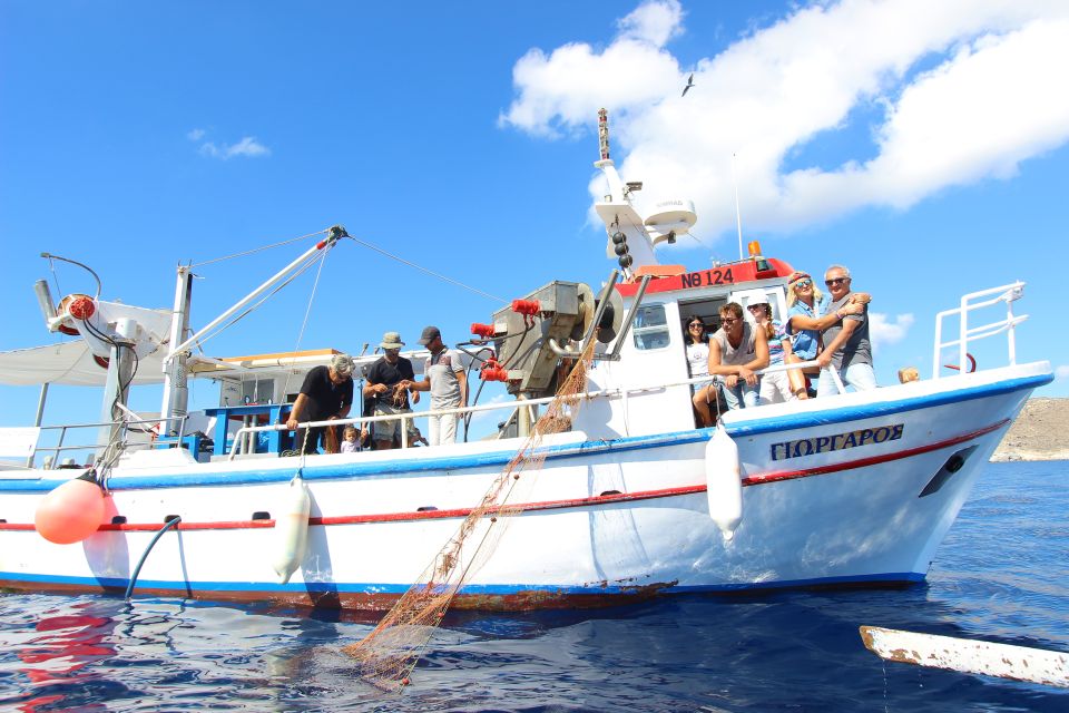 Santorini Sunset Fishing Trip with Dinner and Drinks - Catch, clean, cook: the meal is the finale and the story