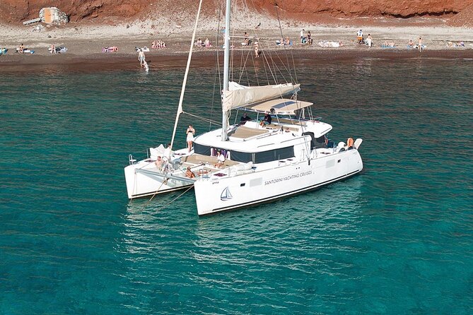 Santorini Sunset Sailing Cruise: Dinner, BBQ, Open Bar, Transfers - Red Beach Stop: Easy Swimming with Big-Color Photos