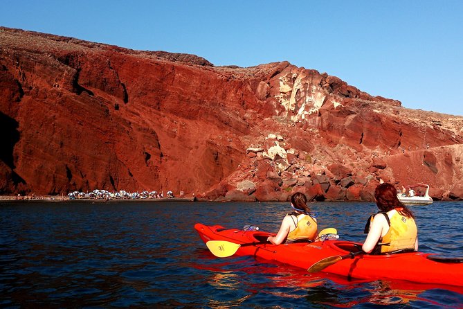 Santorini: Sunset Sea Kayak with Light Dinner with Pick-up Option - Dinner in a tavern: what the included meal really feels like