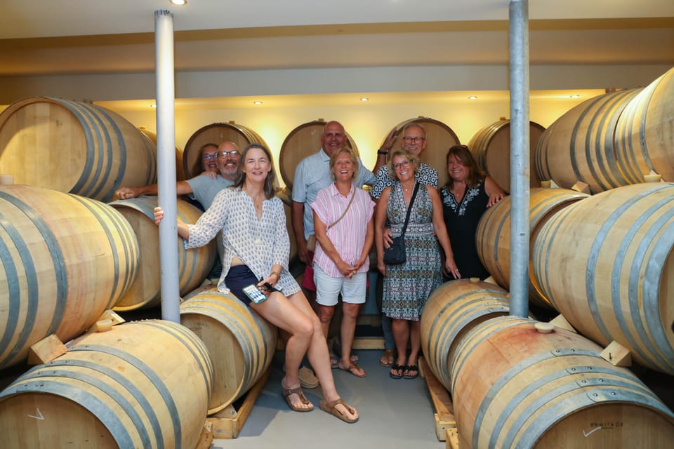 Santorini: Tour of Wineries with Wine Tasting & Food - Winery stop #1: photo moments, a cellar tour, and starter tastings