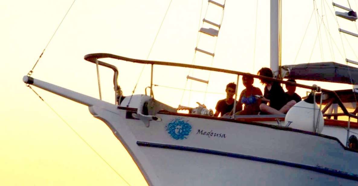 Santorini: Traditional Wooden Boat Tour with Meal and Wine - Sunset option: same route, reversed timing, and a different kind of magic