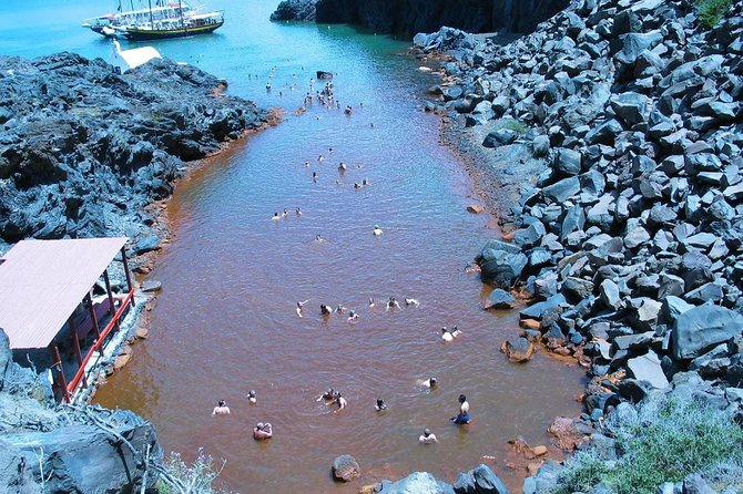 Santorini Volcanic Islands Cruise: Volcano,Hot Springs,Thirassia and Oia Sunset - Oia Sunset: Panoramic Views, Free Time, and the Coach Reality