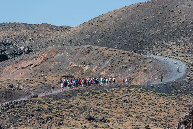 Santorini Volcano and Hot Springs Cruise Tour from Fira Old Port - Nea Kameni volcano hike: €5 entry, real walking, and summit views