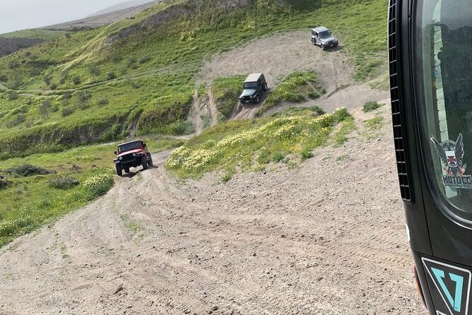 Santorini Wrangler Jeep Afternoon Convoy Tour - Vlychada black-sand photos and Eros beach time by Theros bar