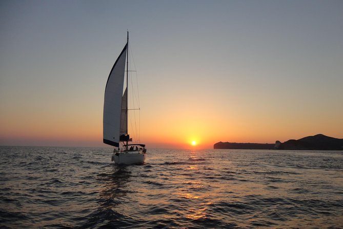 Sunset Caldera Sailing Cruise - Red Beach and White Beach: short stops with big geology
