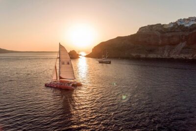 Sunset Sailing Catamaran Cruise in Santorini with BBQ and Drinks - Getting picked up: the real start of your cruise day
