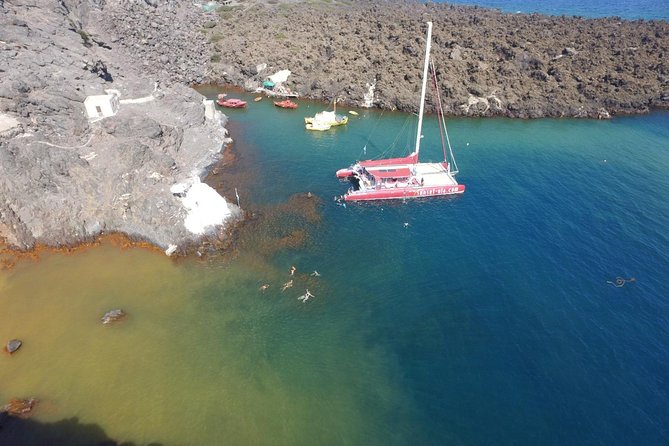 Sunset Sailing Catamaran Cruise in Santorini with BBQ and Drinks - White Beach (1.5 hours) and the BBQ meal on board