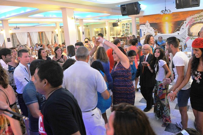 Traditional Greek Night live Music & Dinner Show in Santorini - Seating, crowd flow, and comfort tricks for a better night